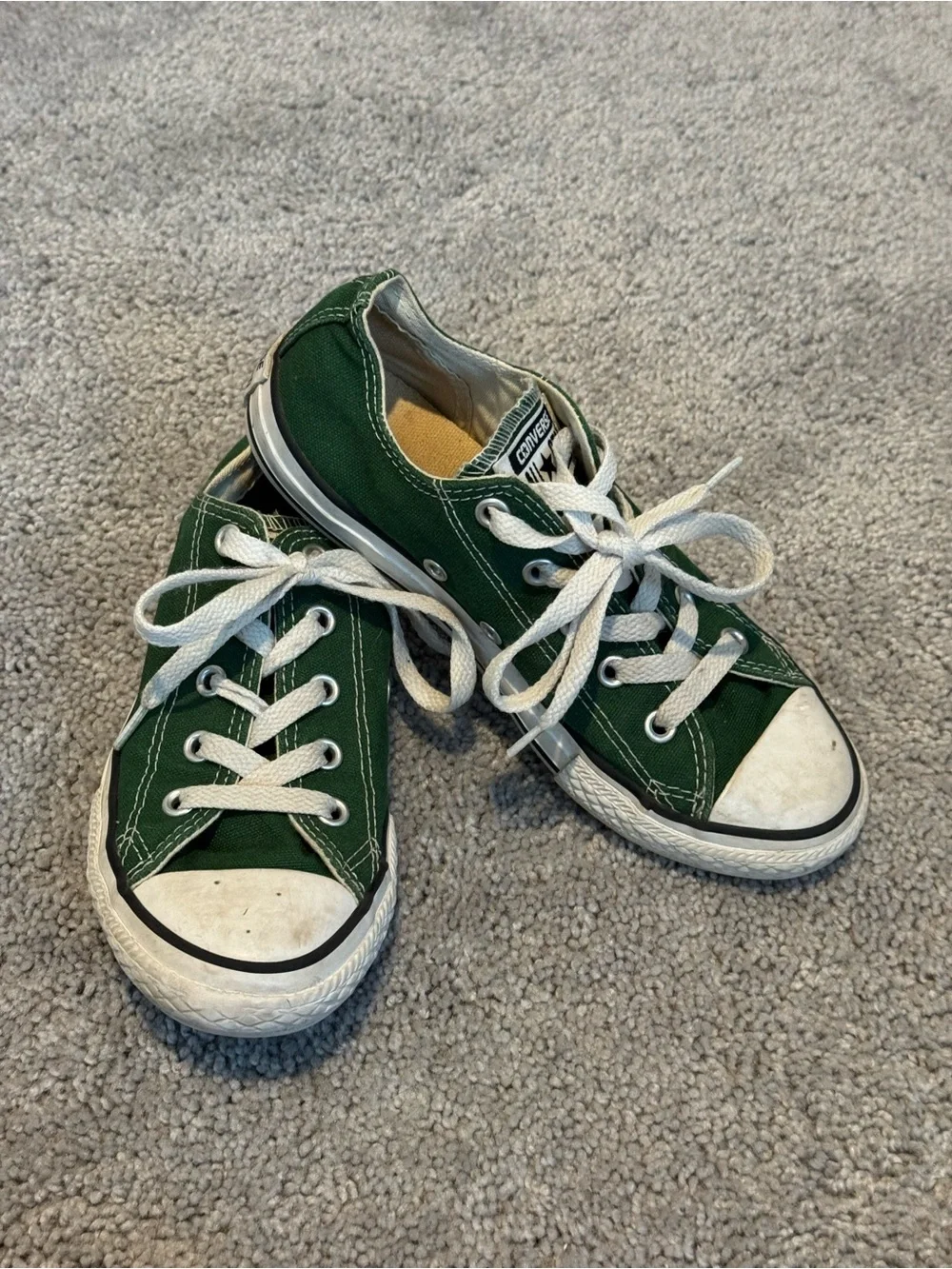 green canvas Converse Chuck Taylor All Star low top sneakers